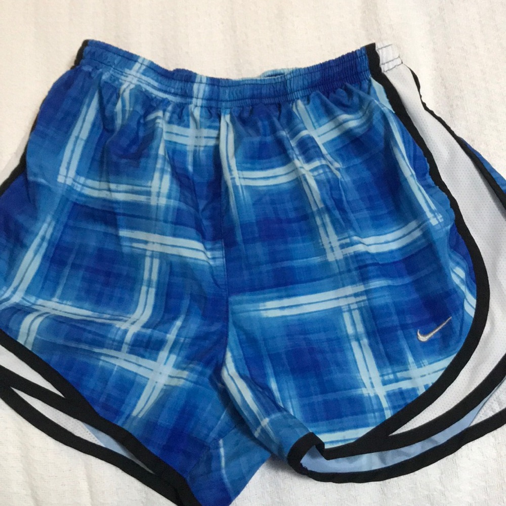 Blue patterned Nike shorts